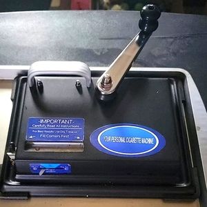 Cigarette rolling machine